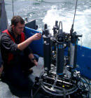 Rick taking a water sample from the CTD Rosette